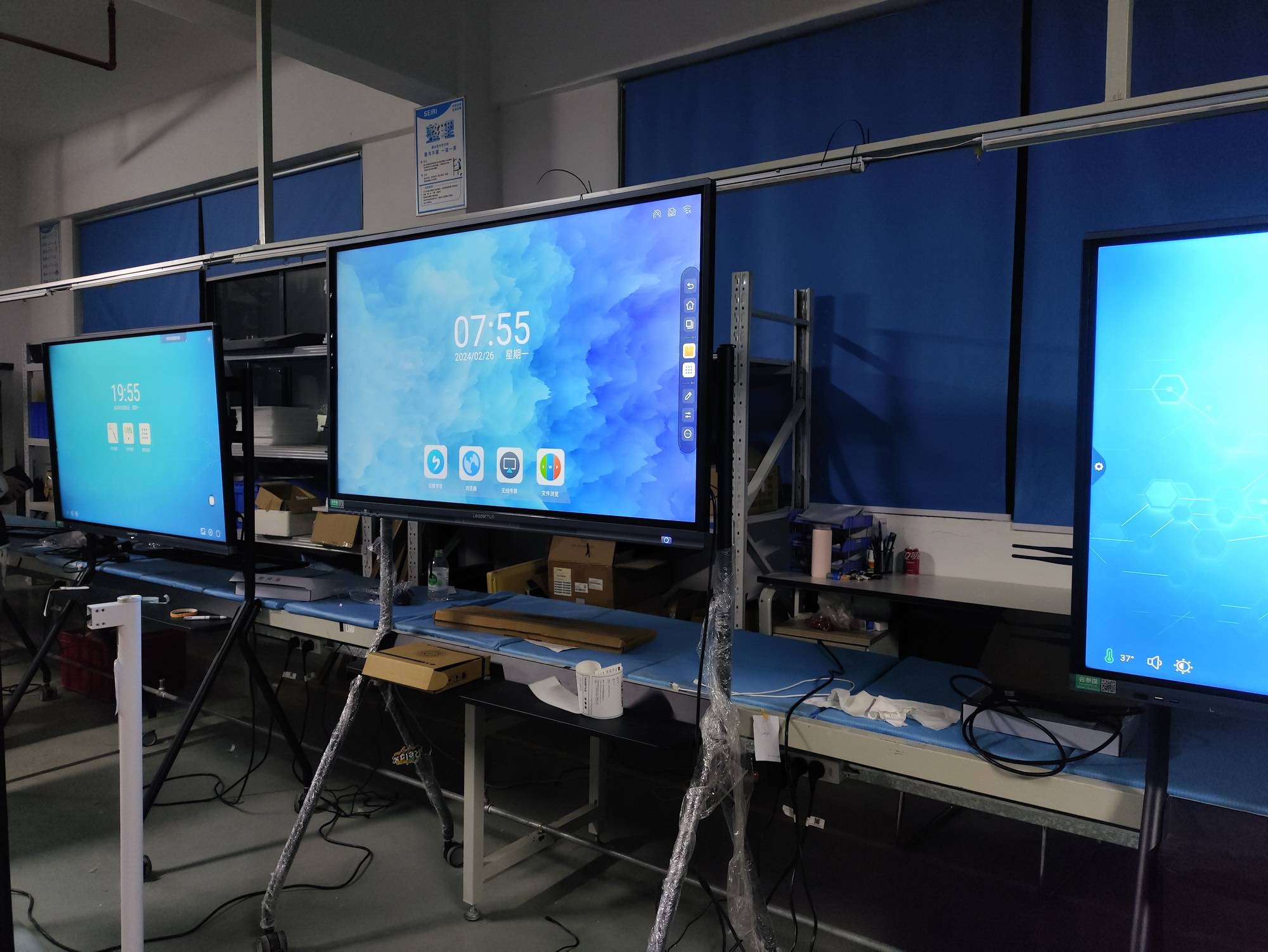Teacher using calibrated interactive smart board in classroom