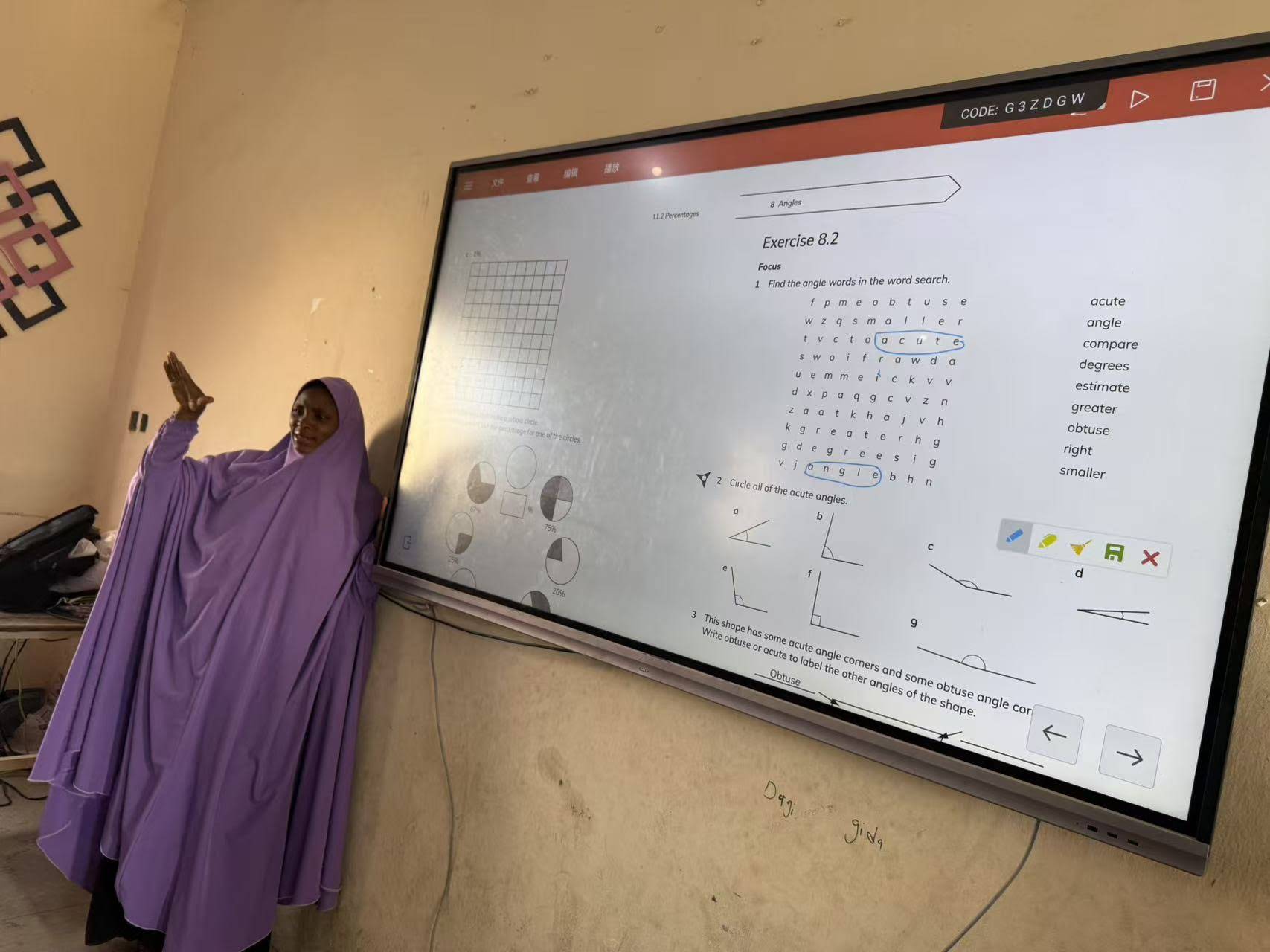 Team collaborating using a smart board during a business meeting