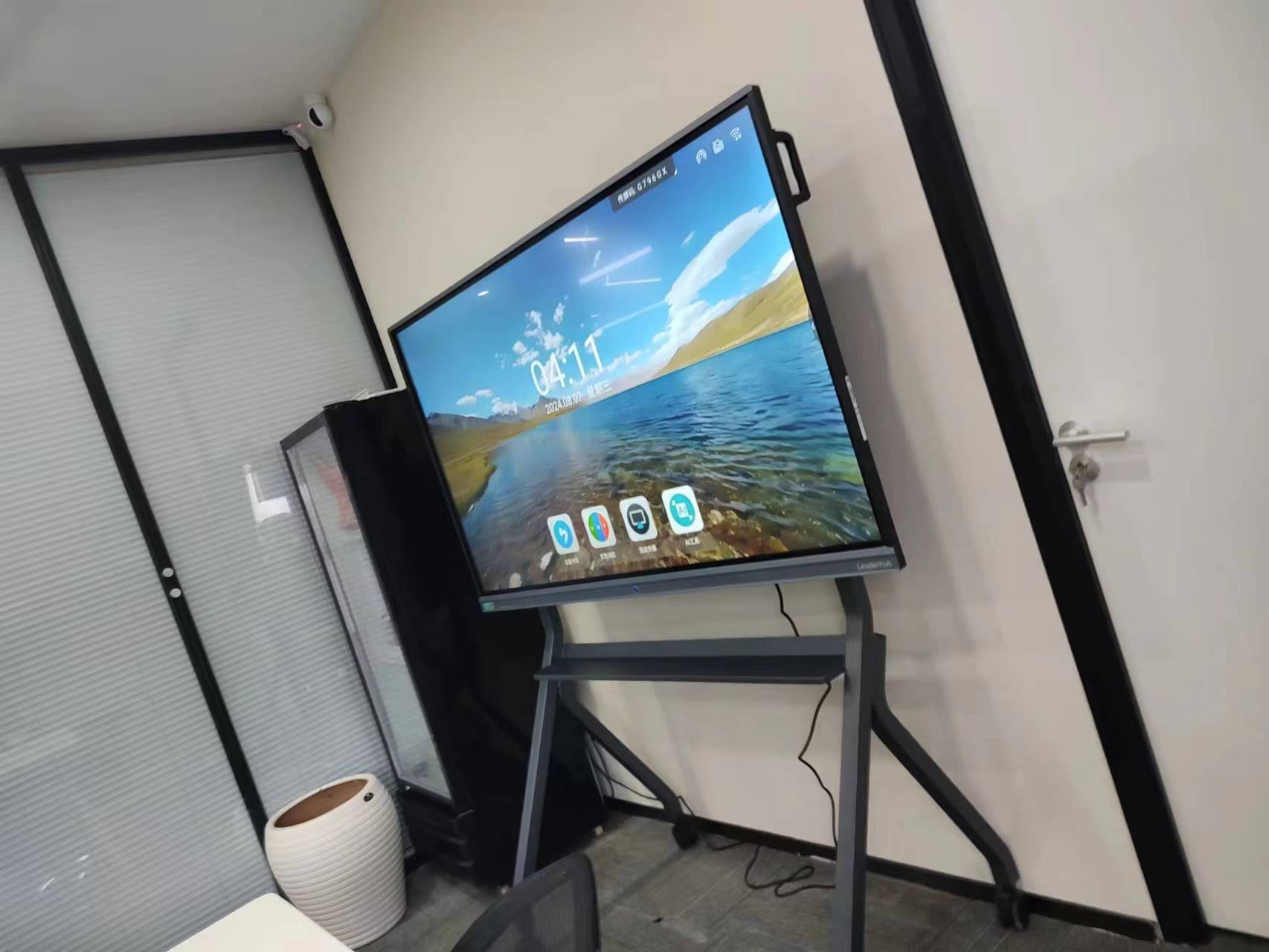 Professional using smart board touch screen in modern conference room
