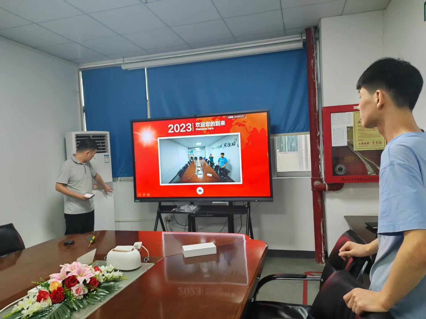 IT professional performing advanced smart board calibration and maintenance