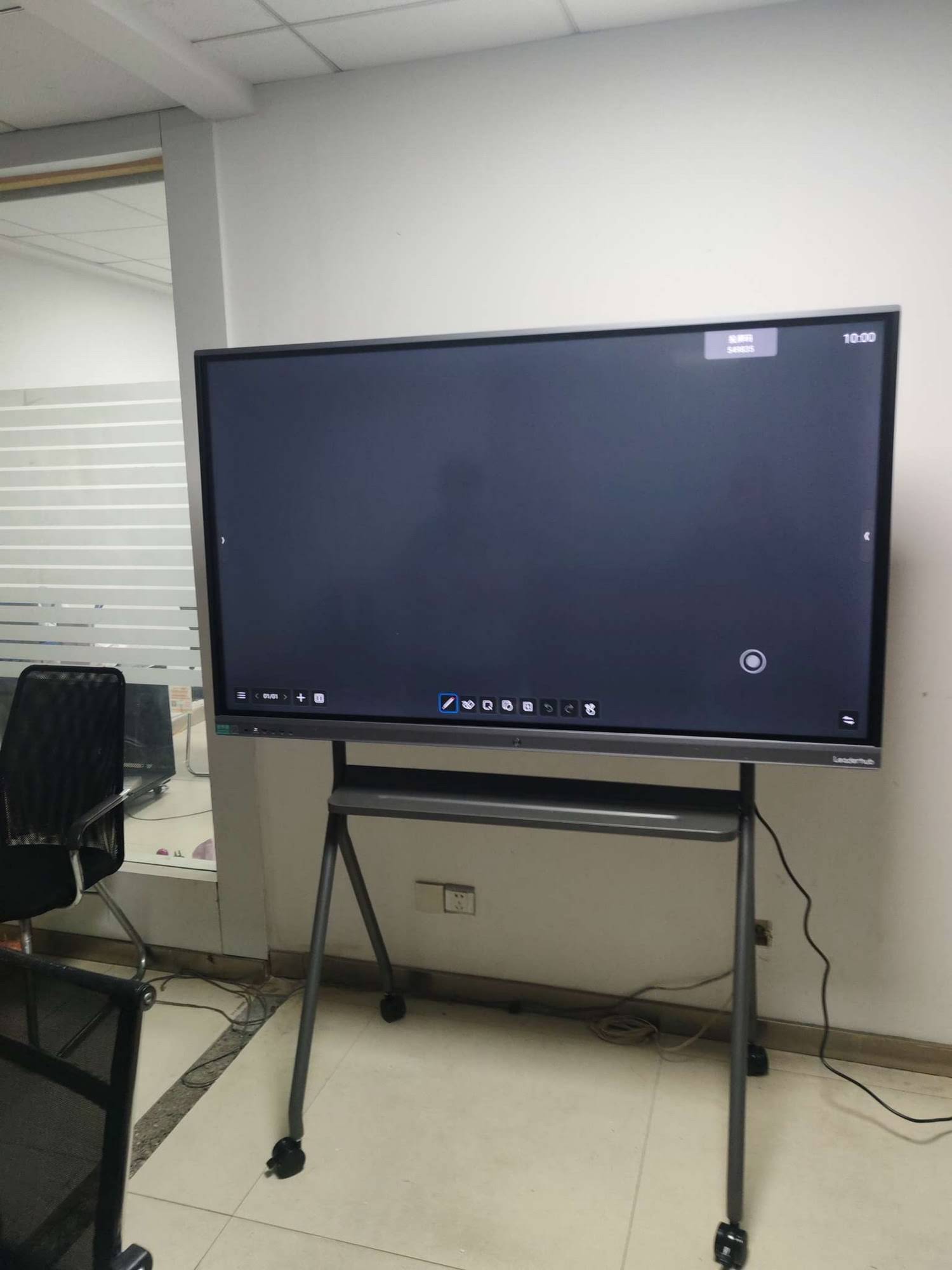 Interactive whiteboard being used in business meeting
