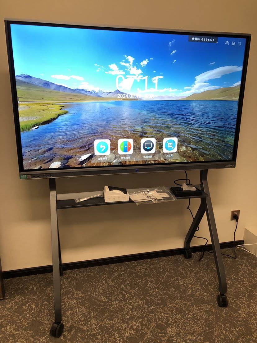 Interactive display showing educational software interface with multiple collaboration features