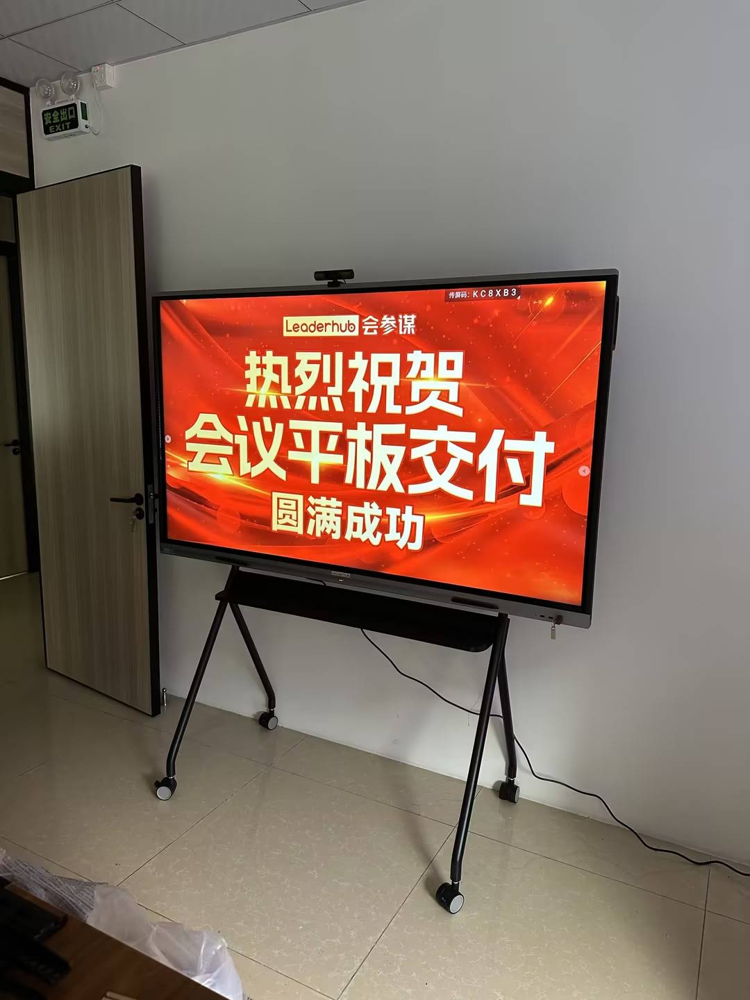 Teacher using a smart board in a modern classroom