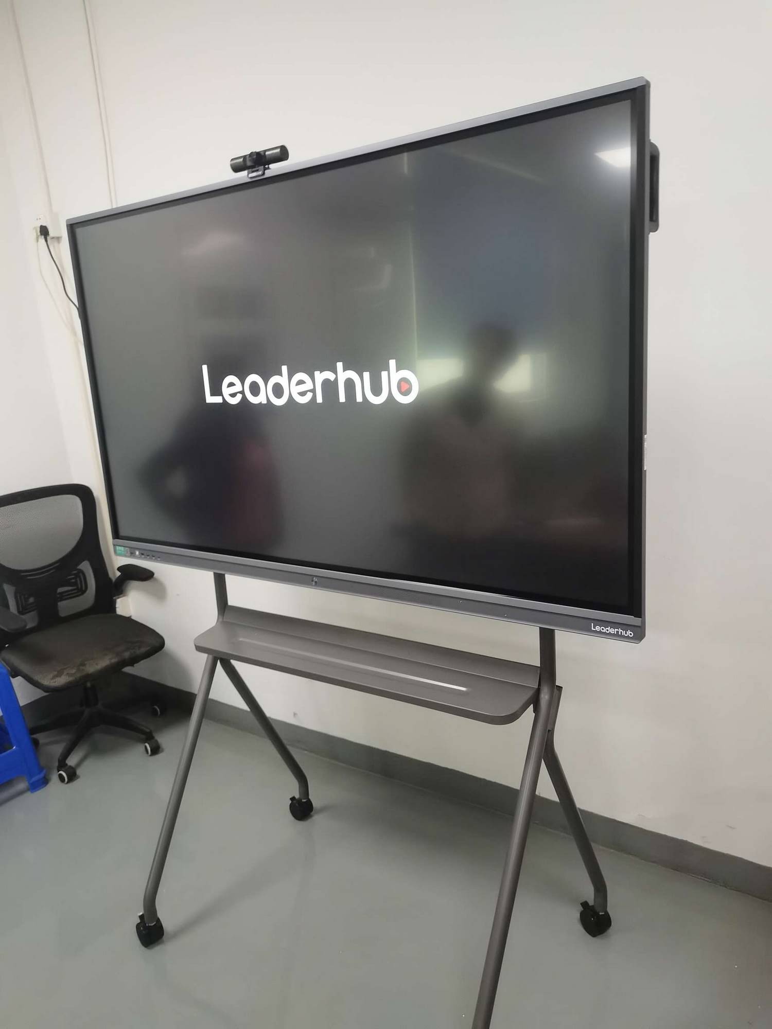 Teacher using smart whiteboard for vocabulary lesson