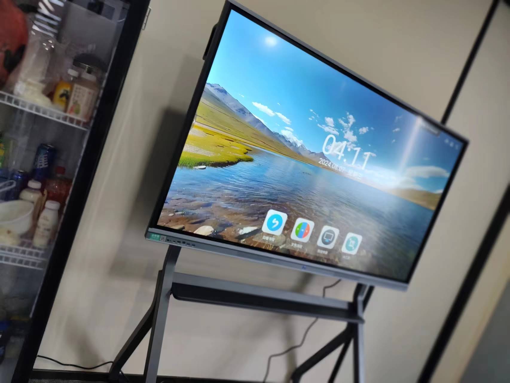 Teacher using calibrated smart whiteboard in classroom