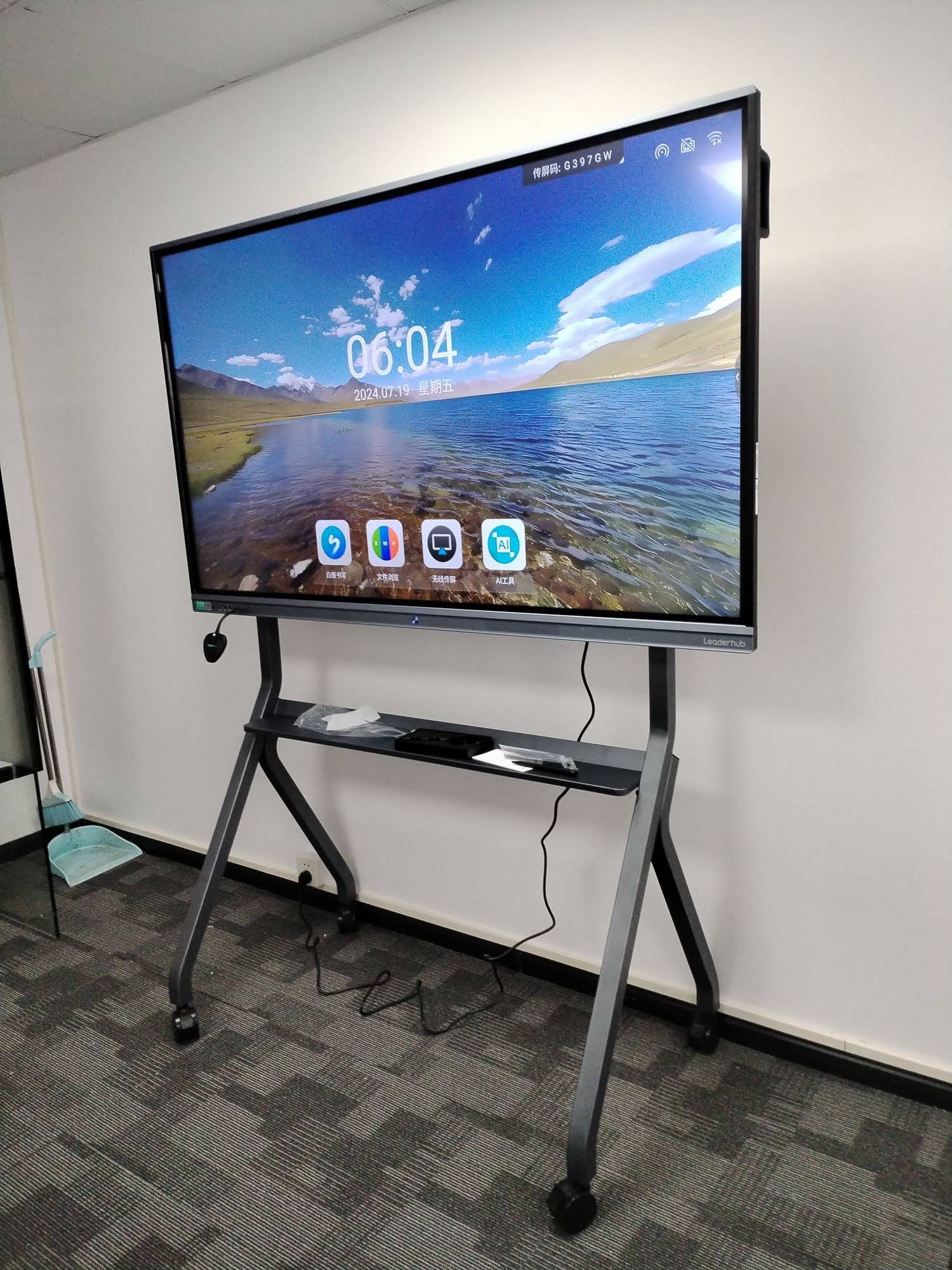 Students interacting with a classroom smart board