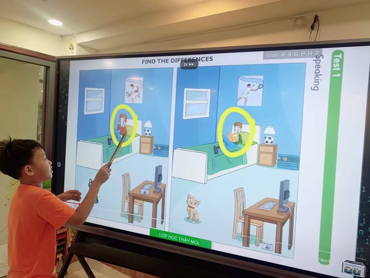 Teacher using smart board for interactive classroom lesson