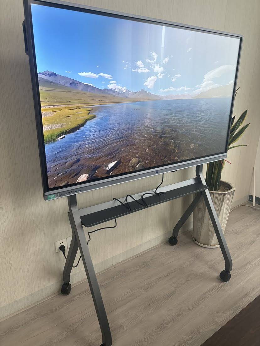 Interactive smart whiteboard installed in modern conference room setting