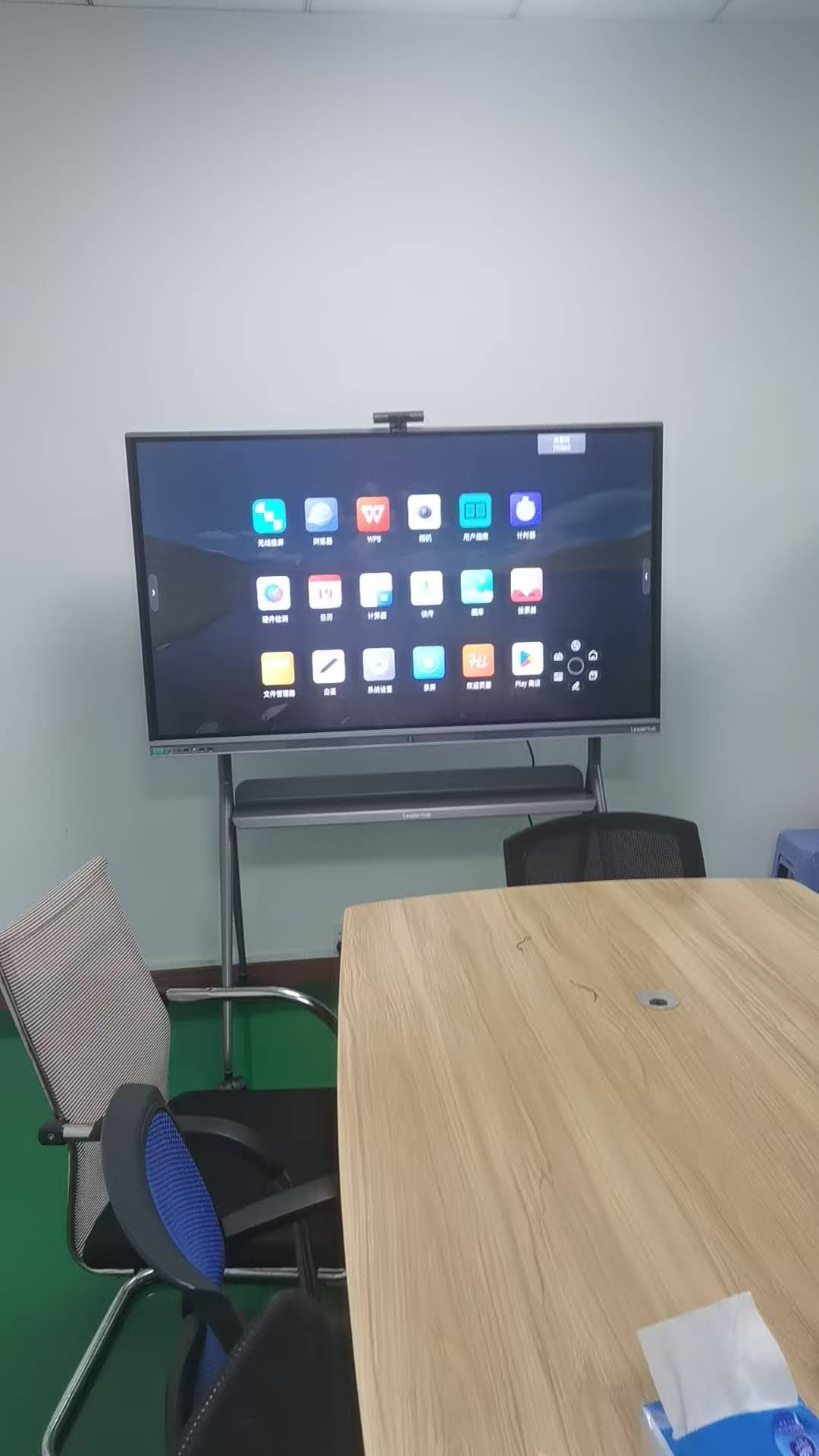 Teacher using a wireless smart board in a classroom