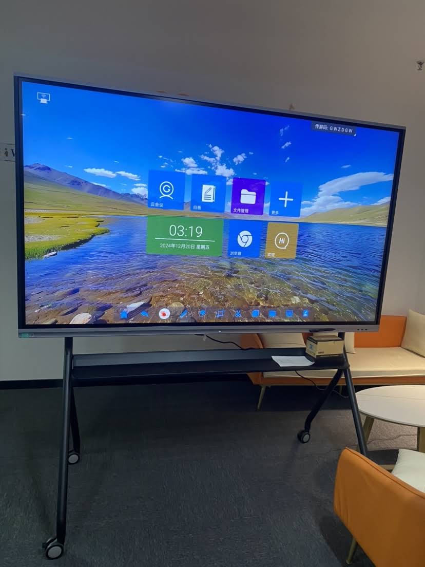 Teacher using interactive whiteboard in classroom environment