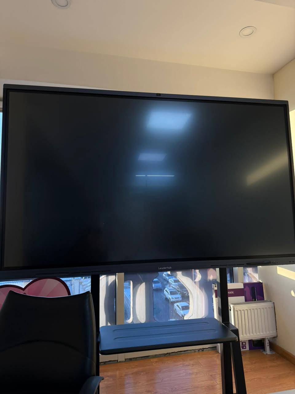 USB-C cable connected to smart board and laptop