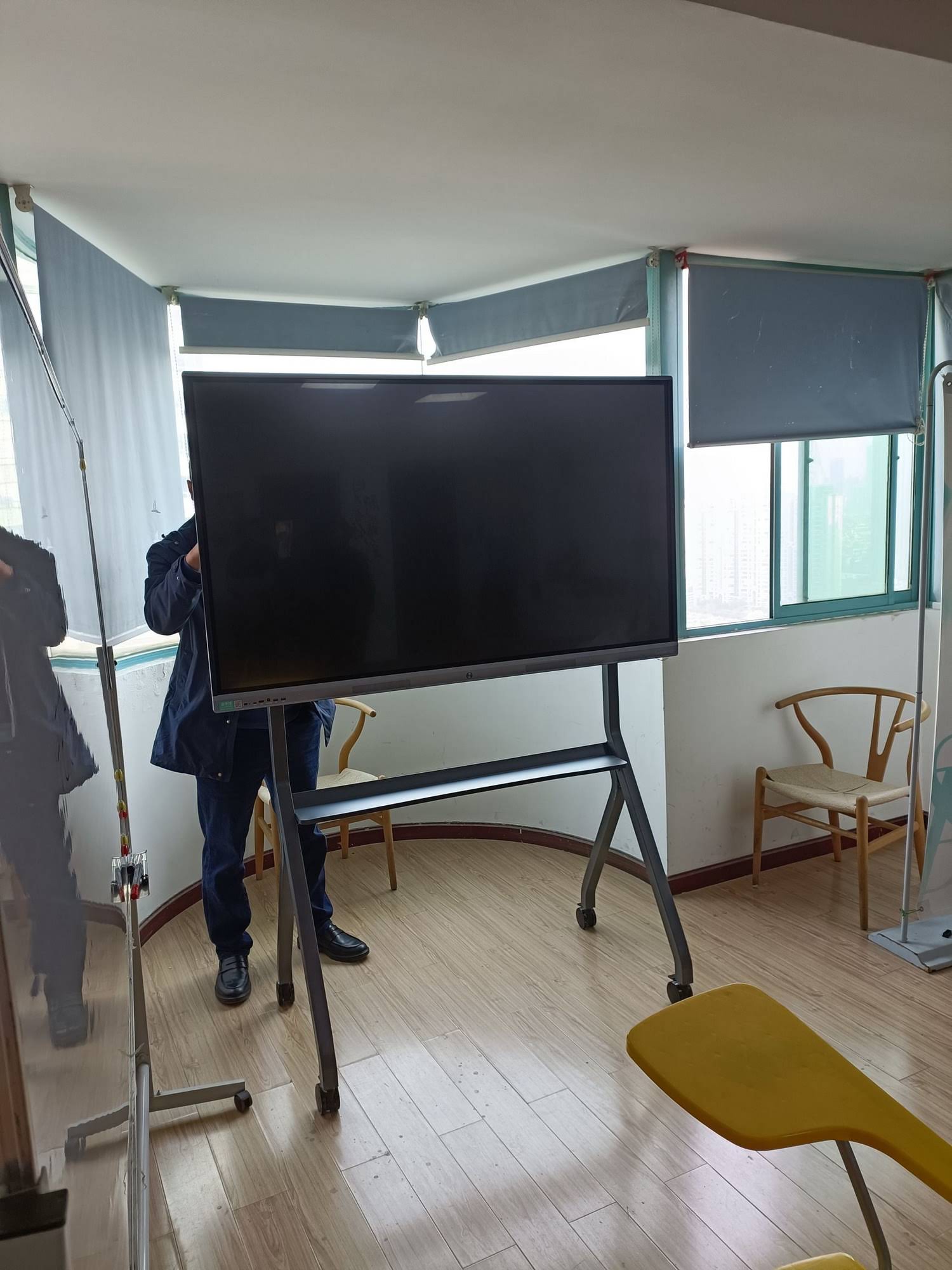 Corporate team collaborating on an interactive smart board
