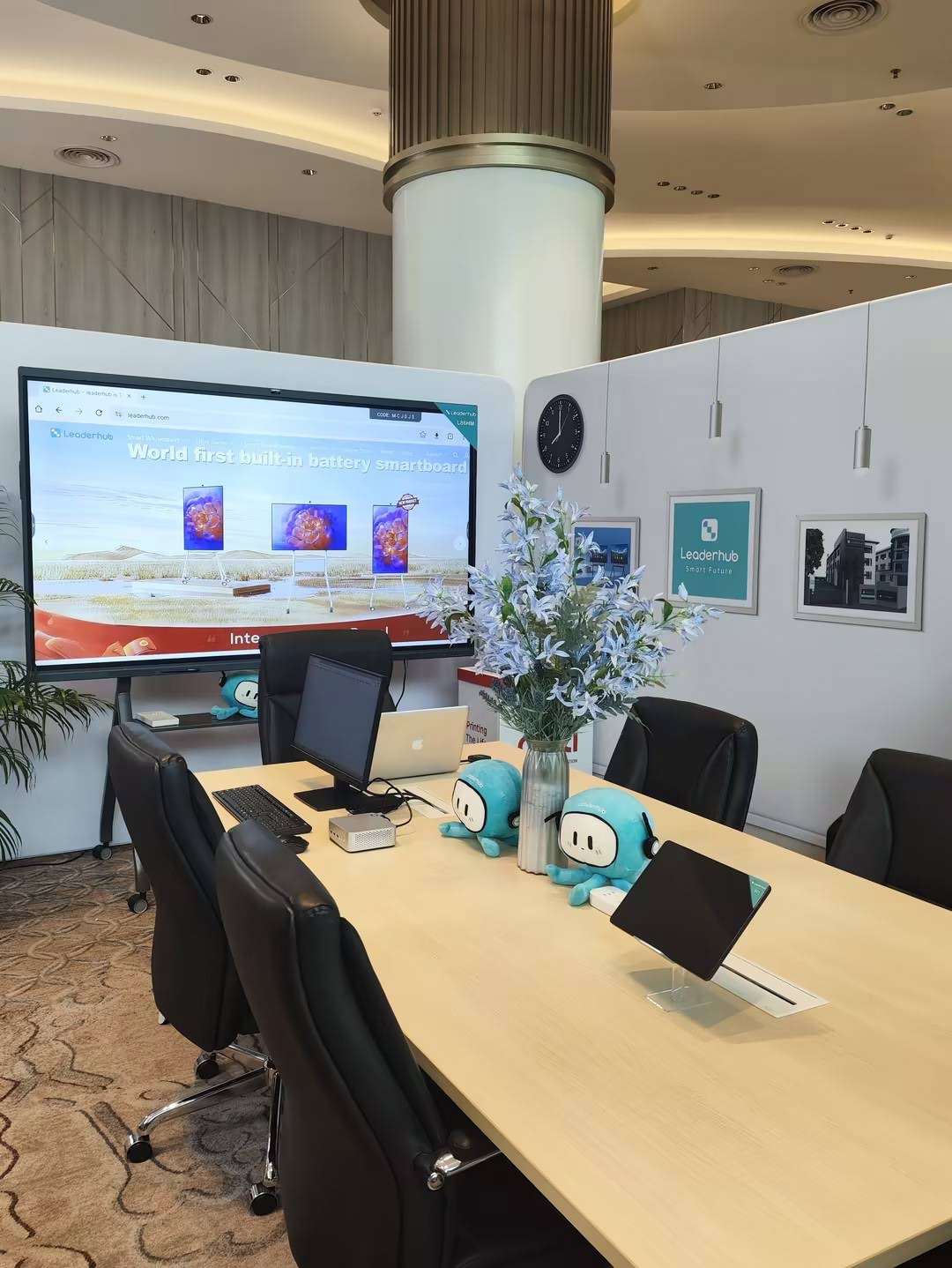 Teacher using an interactive smart whiteboard with multi-touch technology