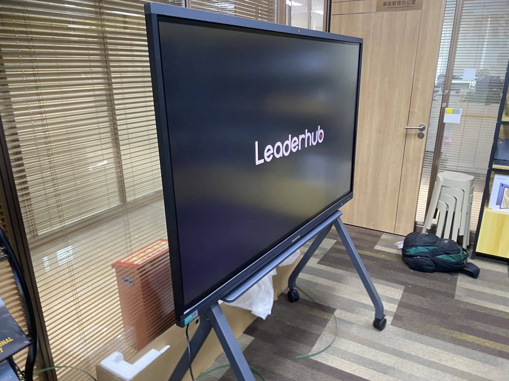 Smart whiteboard with mobile stand in meeting room
