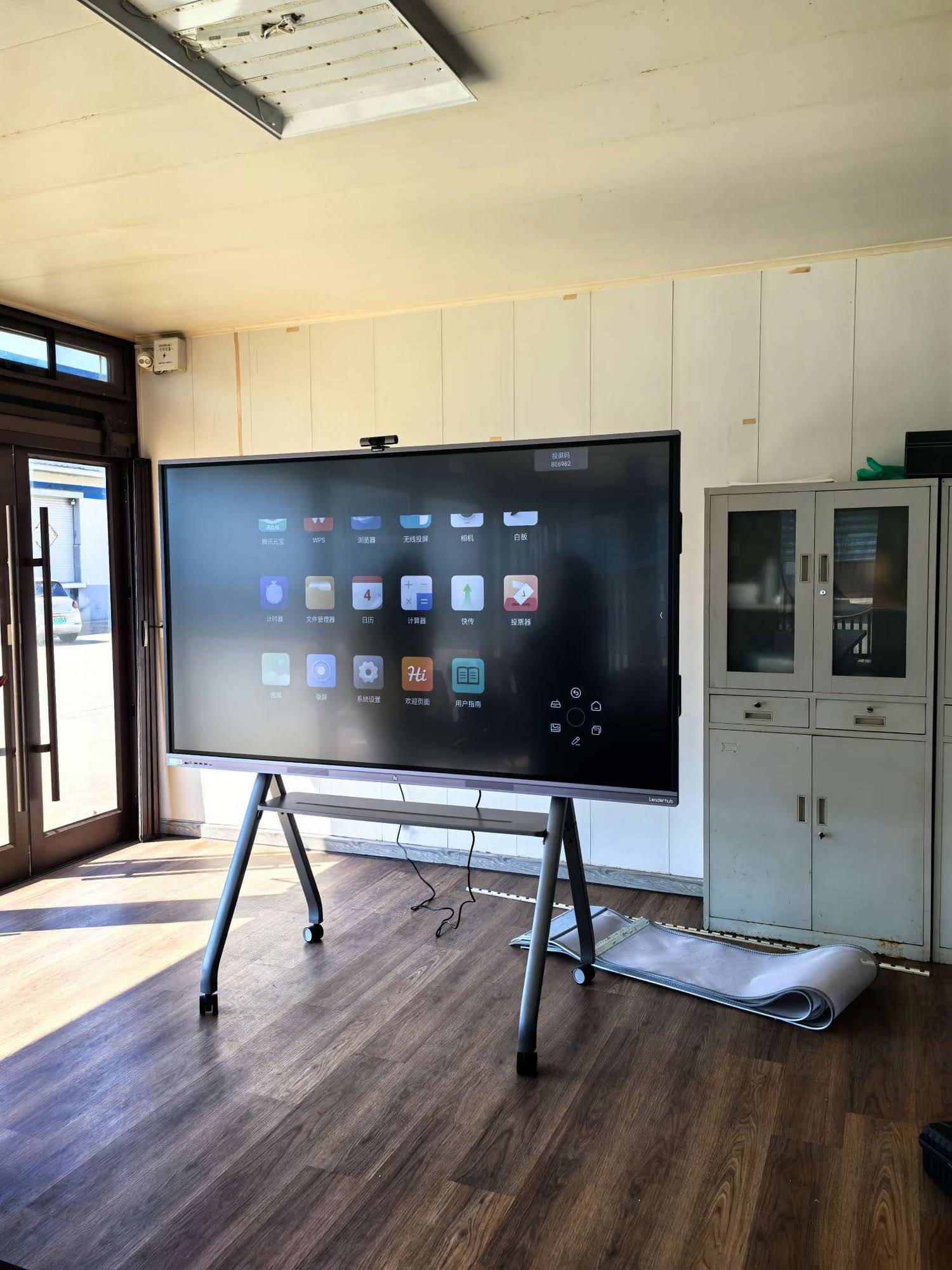 Interactive flat panel display used in a classroom setting